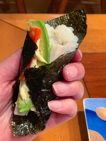 Hand rolled sushi with avocado, crab and mayo
