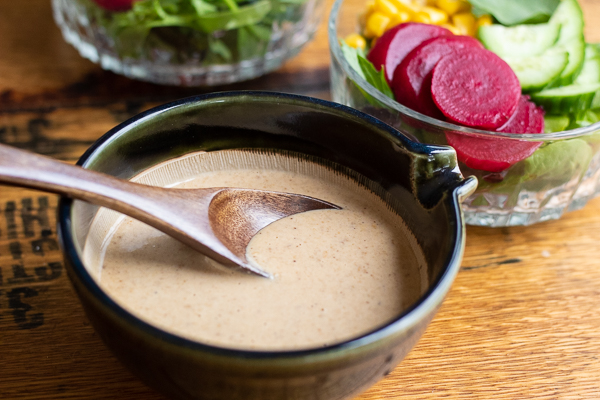 Pro Tip: Wow your guests with a homemade dressing in the Twist & Pour Salad  Dressing Mixer while entertaining.