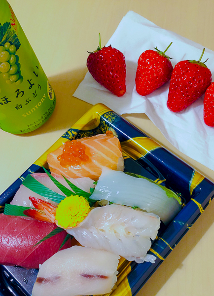 Japanese meal with sushi chuhai and strawberries